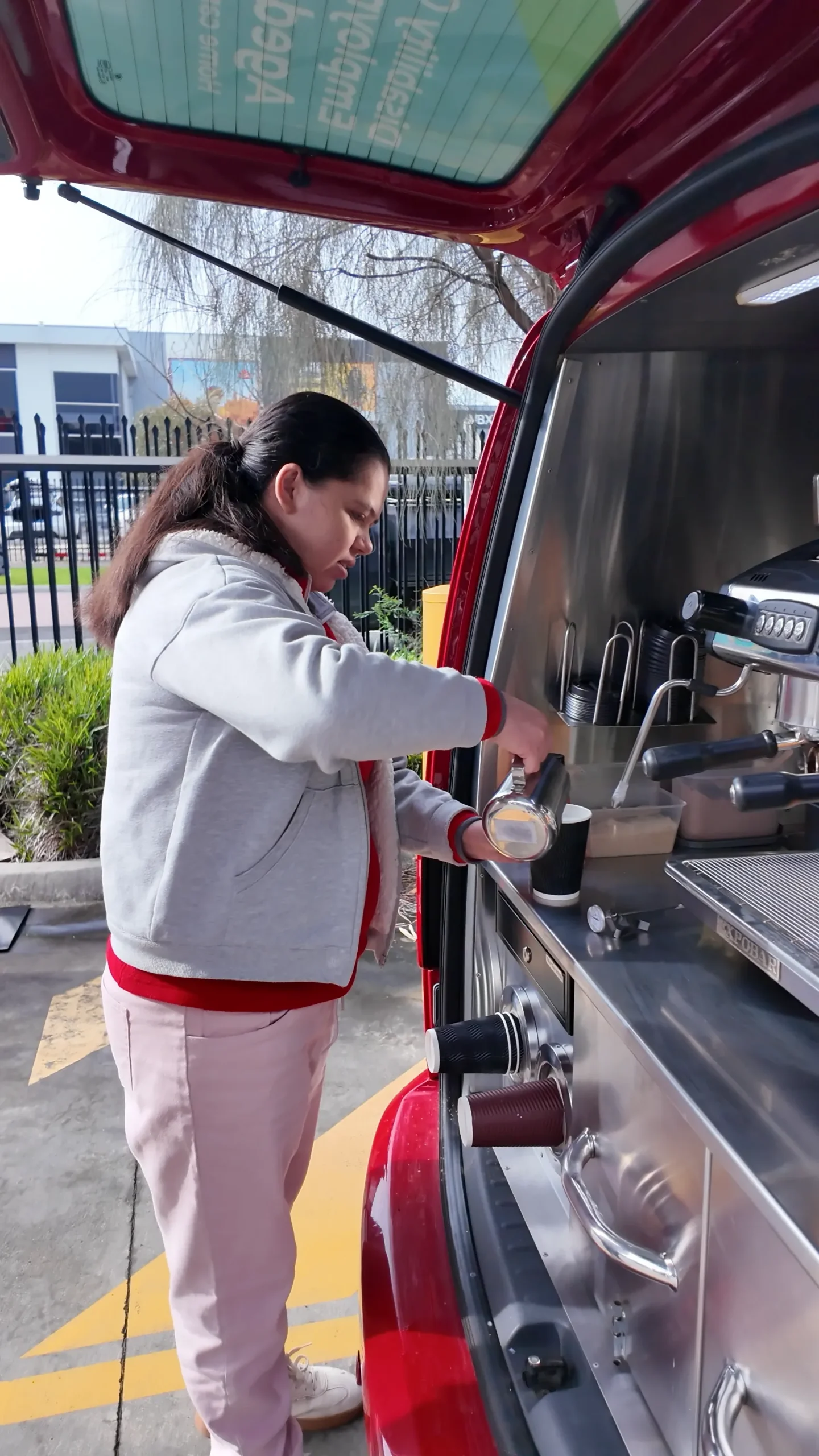 Participant preparing coffee at the BHC coffee van